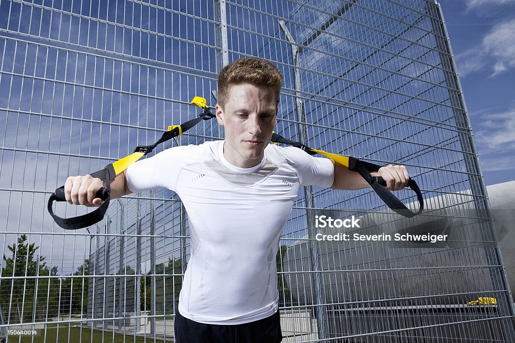 Man working out in industrial area  20-24 Years Stock Photo