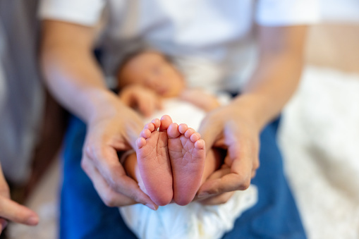 Close up of newborn baby’s foot