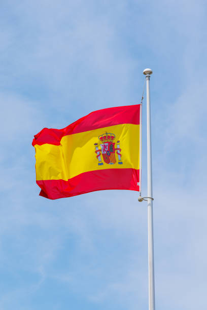 istock Canada flag waving in the wind on blue sky 1506547483