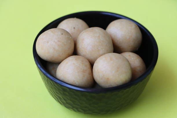 Kaju Laddu or kaju ladoo or cashew Laddoo or cashew sweet balls made with cashew flour and jaggery, Indian sweet Kaju Laddu or kaju ladoo or cashew Laddoo or cashew sweet balls made with cashew flour and jaggery, Indian sweet, festival food rawa island stock pictures, royalty-free photos & images