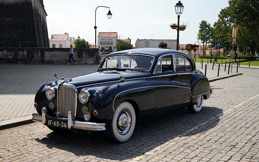 Dark blue Jaguar Mark IX, four-door luxury saloon car, produced between 1958 and 1961, seen in Mafra, Portugal