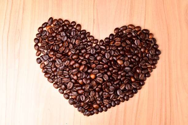 istock Top view of heart shape from roasted coffee beans 1506561629