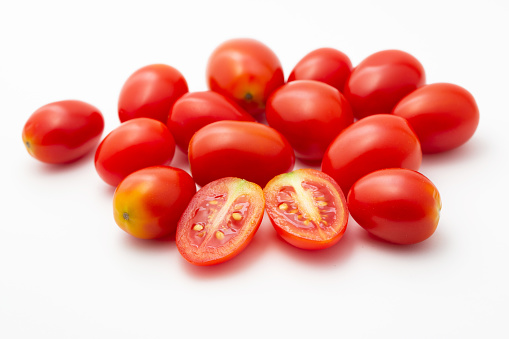 Cherry tomatoes fresh fruits healthy food in white background.