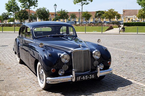 Dark blue Jaguar Mark IX, four-door luxury saloon car, produced between 1958 and 1961, seen in Mafra, Portugal