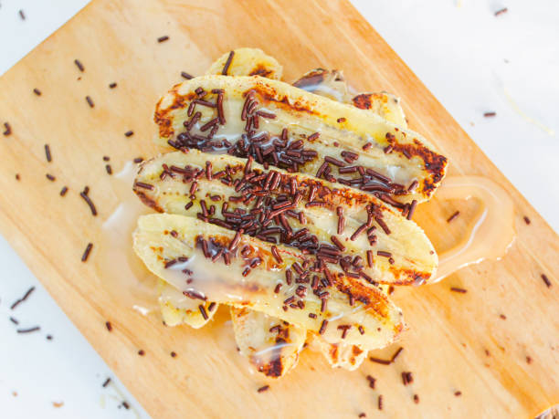 istock Grilled Banana with Milk and Chocolate Sprinkle 1506591481