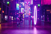 Metaverse Cyberpunk Style City With Astronaut Walking Through Futuristic Portal