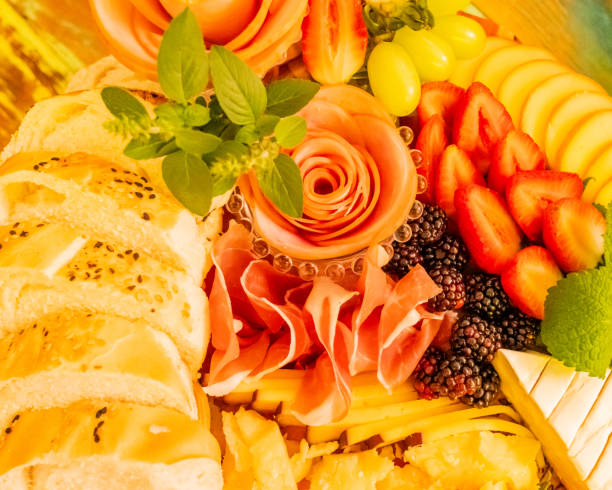 istock cold cuts board with cheeses, fruits and jams 1506628002