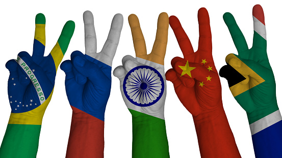 BRICS 5 Hands in victory sign with flags of member countries, on a white background