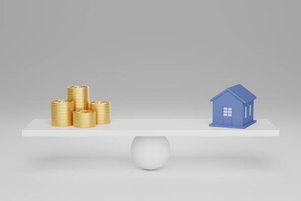 istock 3d house model with stack of coins on seesaw 1506686646
