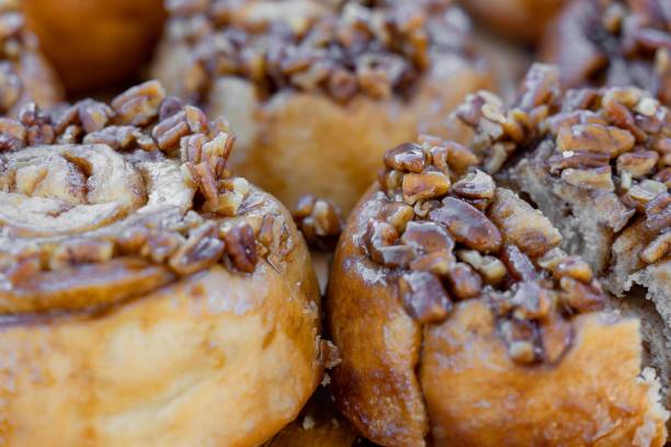 istock Closeup of delicious cinnamon rolls with walnuts 1506703187