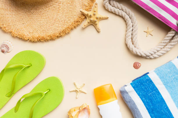istock Summer vacation concept flat lay. straw hat beach accessories and towel top view. Space for text. travel concept 1506709860