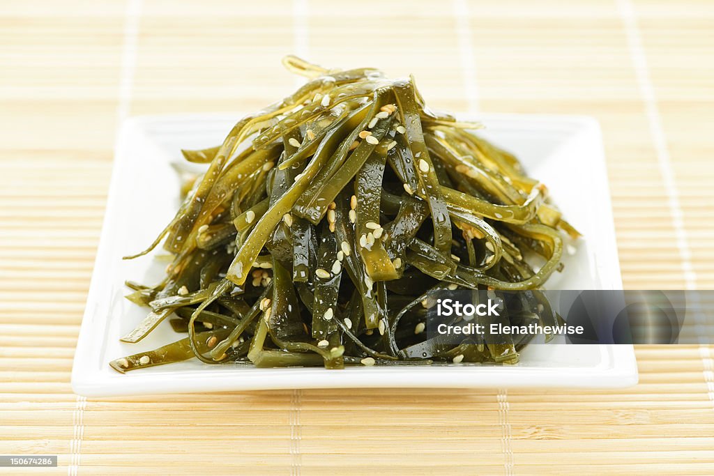 Seaweed salad Plate of traditional japanese wakame seaweed salad Appetizer Stock Photo