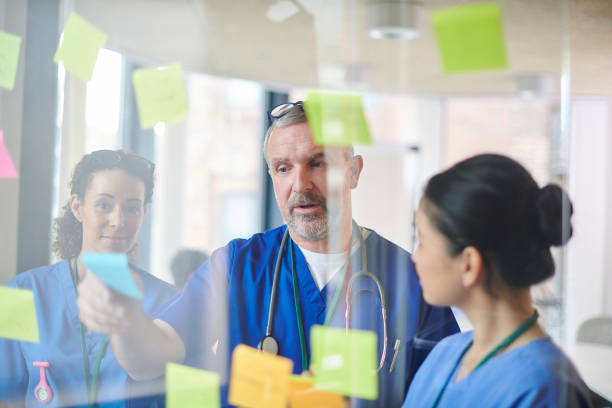 istock doctor brainstorming with colleagues 1506783486