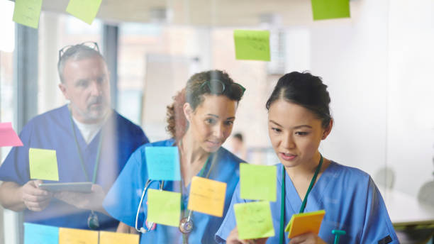 istock doctor brainstorming with colleagues 1506784603