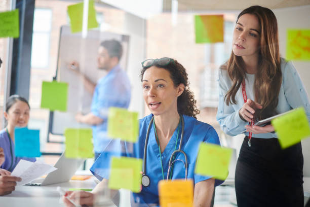 istock medical team presentation to business 1506787974
