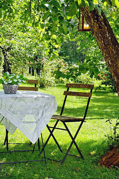 istock Idyllic setting of a small coffee table and wooden chair 150680674