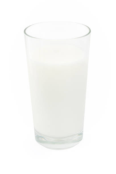 istock Glass of milk over white 150681287