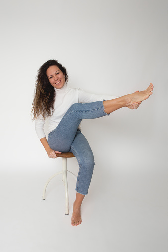 Woman portrait with Vitiligo skin condition. What triggers Vitiligo