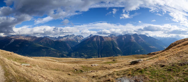 panoramic photo from bettmerhorn mountain in switzerland. view of the betlihorn, breithorn, bortelhorn, hillehorn, helsenhorn mountains in the swiss alps - bettmerhorn imagens e fotografias de stock