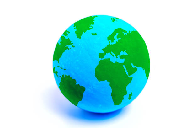istock Miniature Globe with Green Continents on White Background