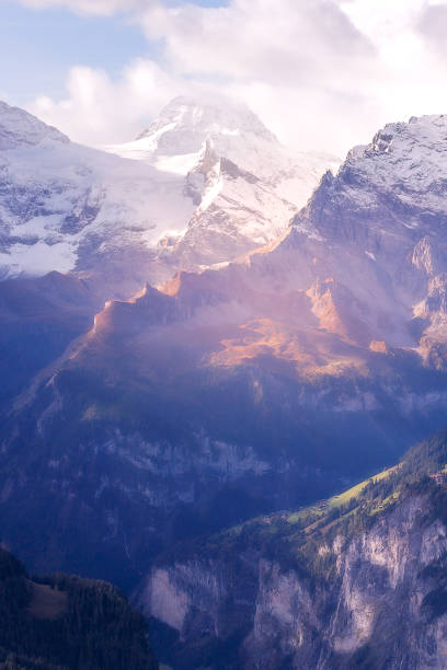 panorama of swiss alps first snow, switzerland - monch sun snow european alps imagens e fotografias de stock