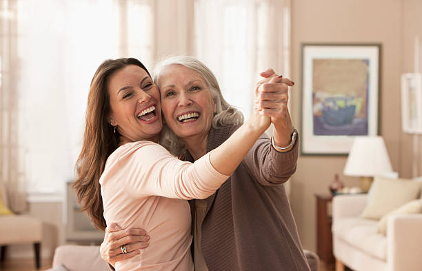 Mother and daughter dancing New Jersey cheek to cheek photos stock pictures, royalty-free photos & images