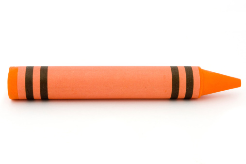 Siingle lápiz de color naranja Aislado en blanco photo