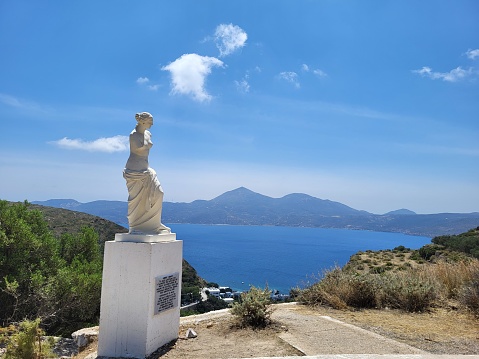 Venus statue with blue sea and Mountain background