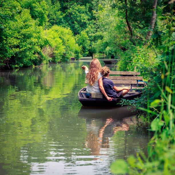 istock Marais Poitevin,  boardwalk in wooden boat 1506866399