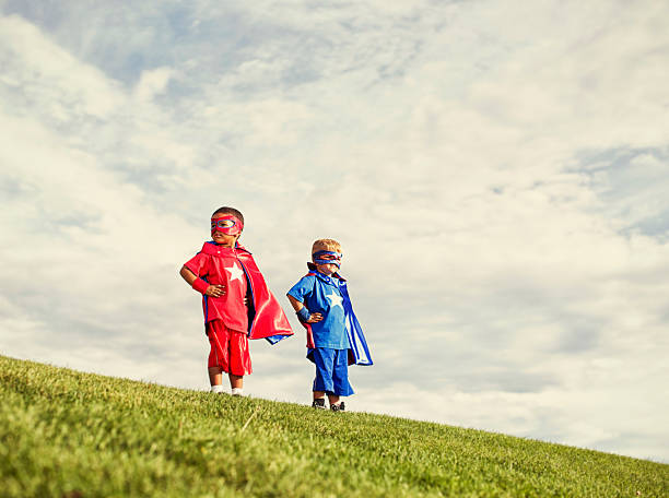 little supers - partnership creativity superhero child photos et images de collection