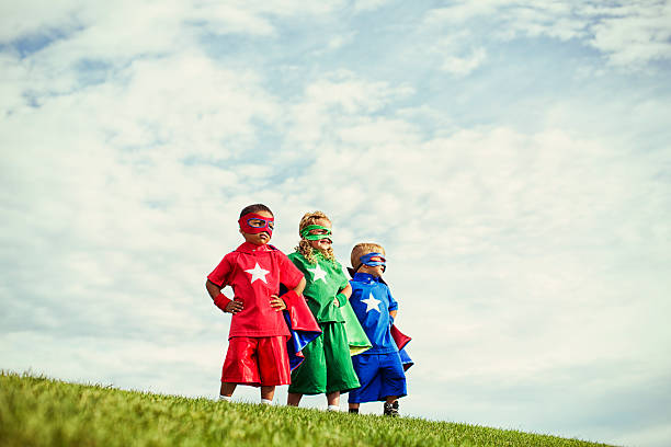 super preschoolers - superhero child partnership teamwork zdjęcia i obrazy z banku zdjęć
