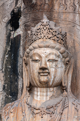 Luoyang, China - October 31. 2011: Buddha portrait in Longmen Grottoes. China. The grottoes were built over the period from 493 AD to 1127 AD