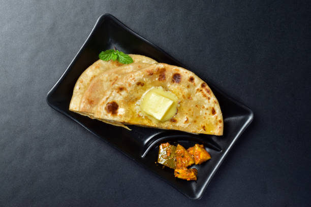 istock butter paratha with aam ka achar 1506899813