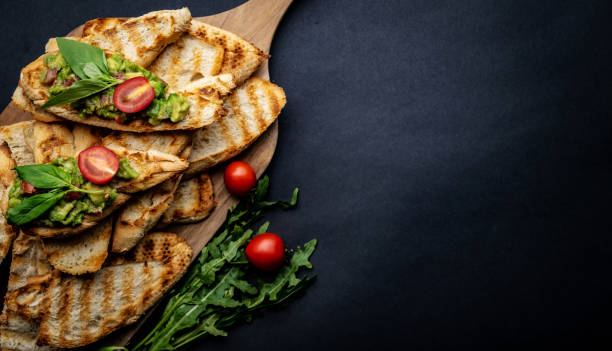 istock Bruschettas with guacamole and cherry tomatoes 1506906967