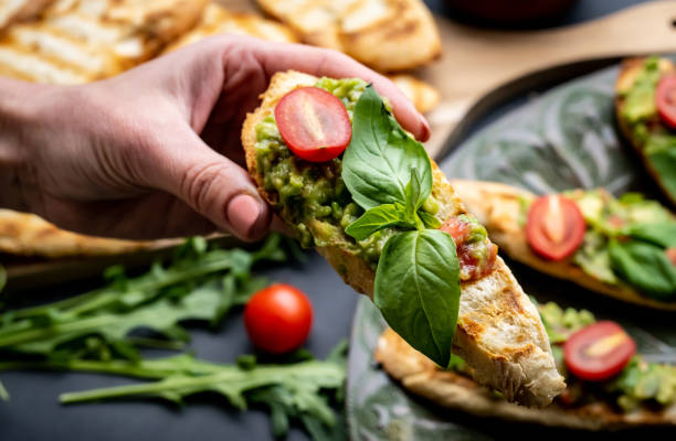 istock Bruschettas with guacamole and cherry tomatoes 1506907005