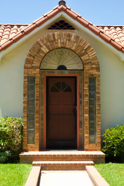 Distinctive wood front door with brick detail