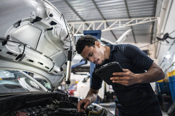 istock Mechanic using the digital tablet at an auto repair shop 1506946667