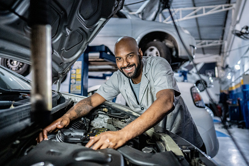 Portrait of a mechanic in an auto repair shop