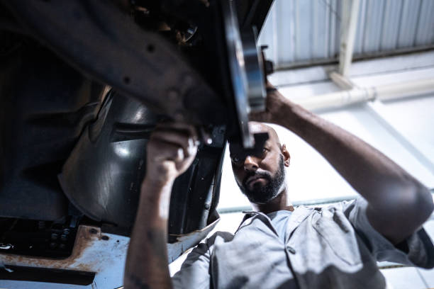 Mechanic repairing a car in an auto repair shop