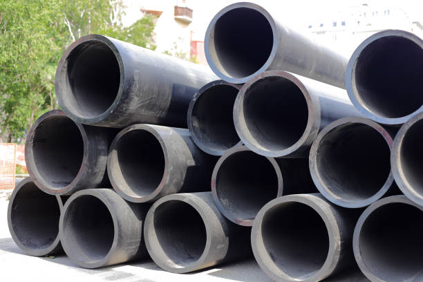 istock Black pipes pile for water or construction supplies 1506973949