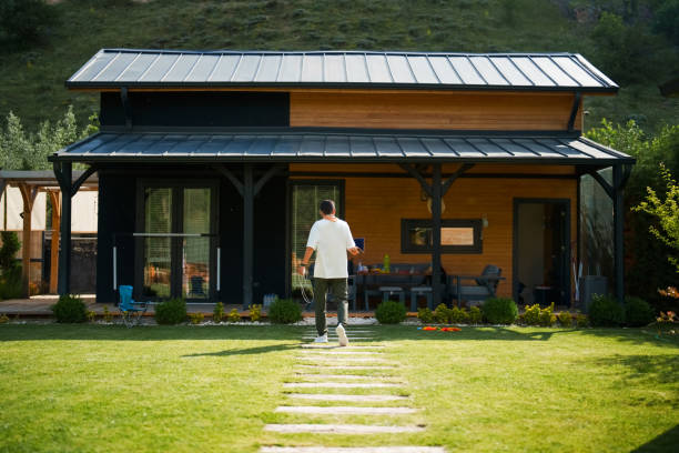 istock Man carrying food to table, weekend activities at the backyard 1506992961