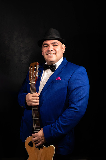 Latin musician on a black background