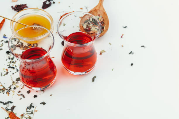 istock Tea in a glass cup with spices and herbs. Top view. 1507038608