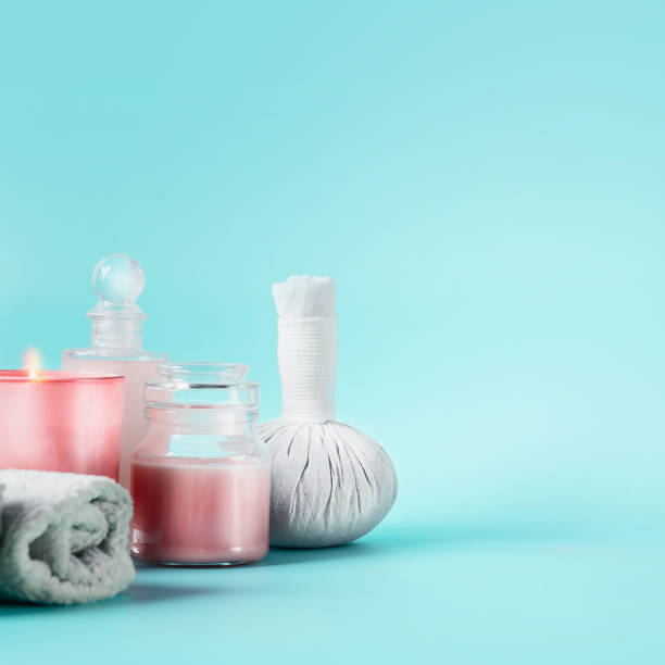 istock Spa beauty background  with massage equipment on pastel blue table. 1507043704