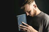 man holding a bible