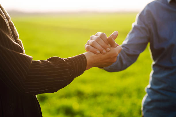 istock Two farmers shake hands 1507131167
