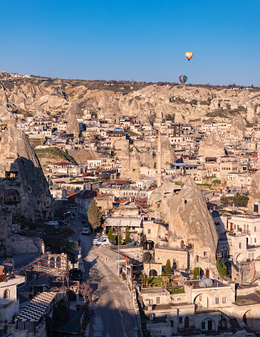 A picture of the town of Goreme, in Cappadocia, at sunrise.