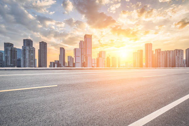 istock Empty asphalt road and city buildings skyline 1507160690