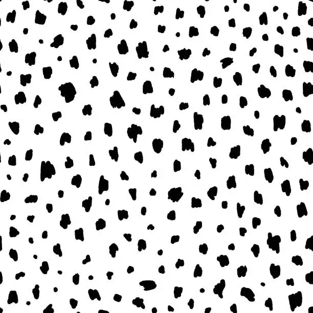 Vector illustration of Black and white leopard print seamless pattern. Hand drawn black spots on white background.