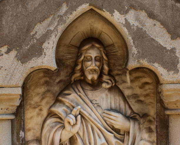 istock golden christ carved into the rock 1507181317